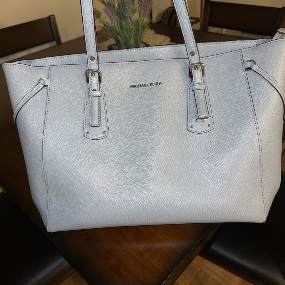 Beautiful baby blue Michael Kors purse
Large